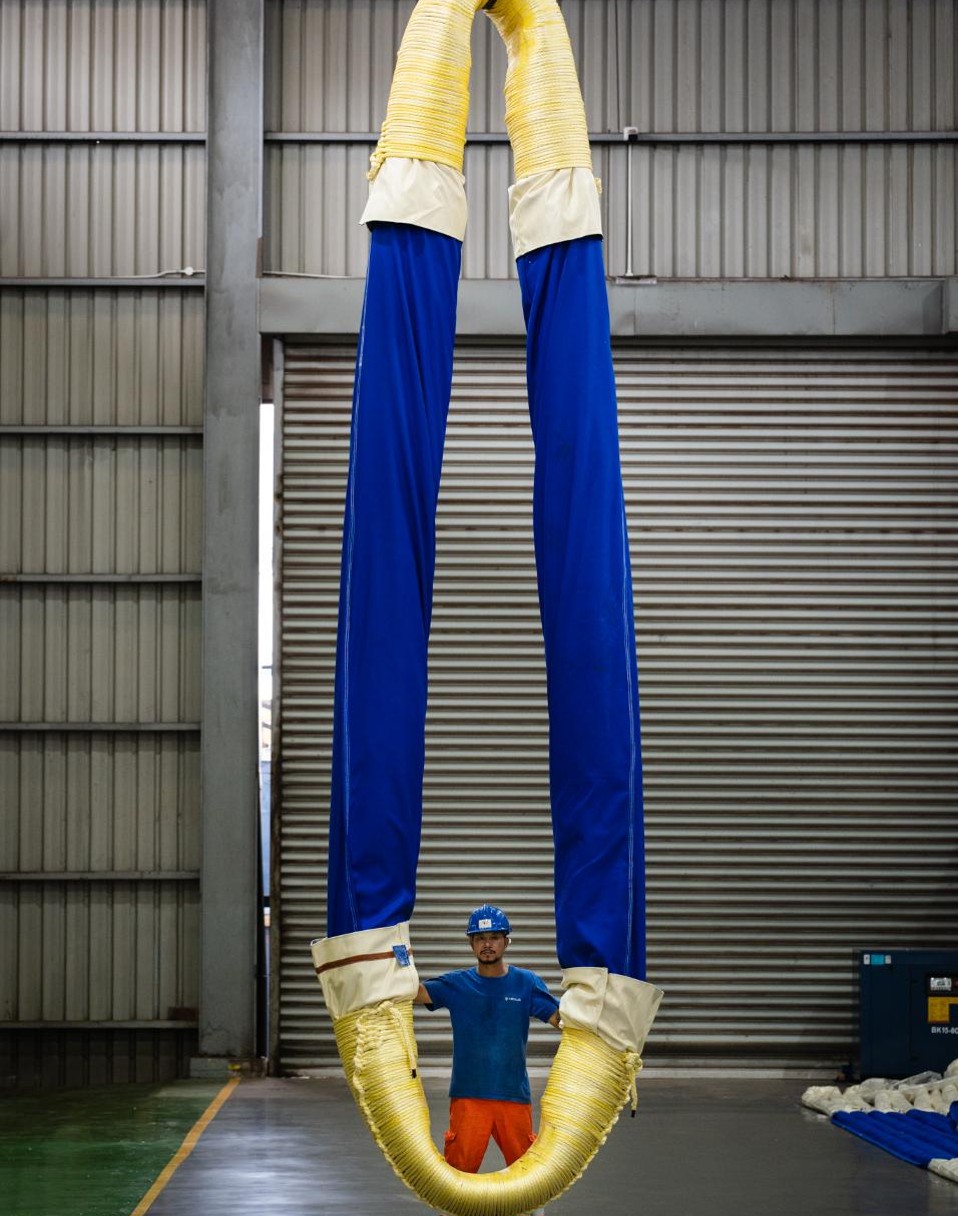 NXRS 5560 round sling hanging in the factory, person for scale