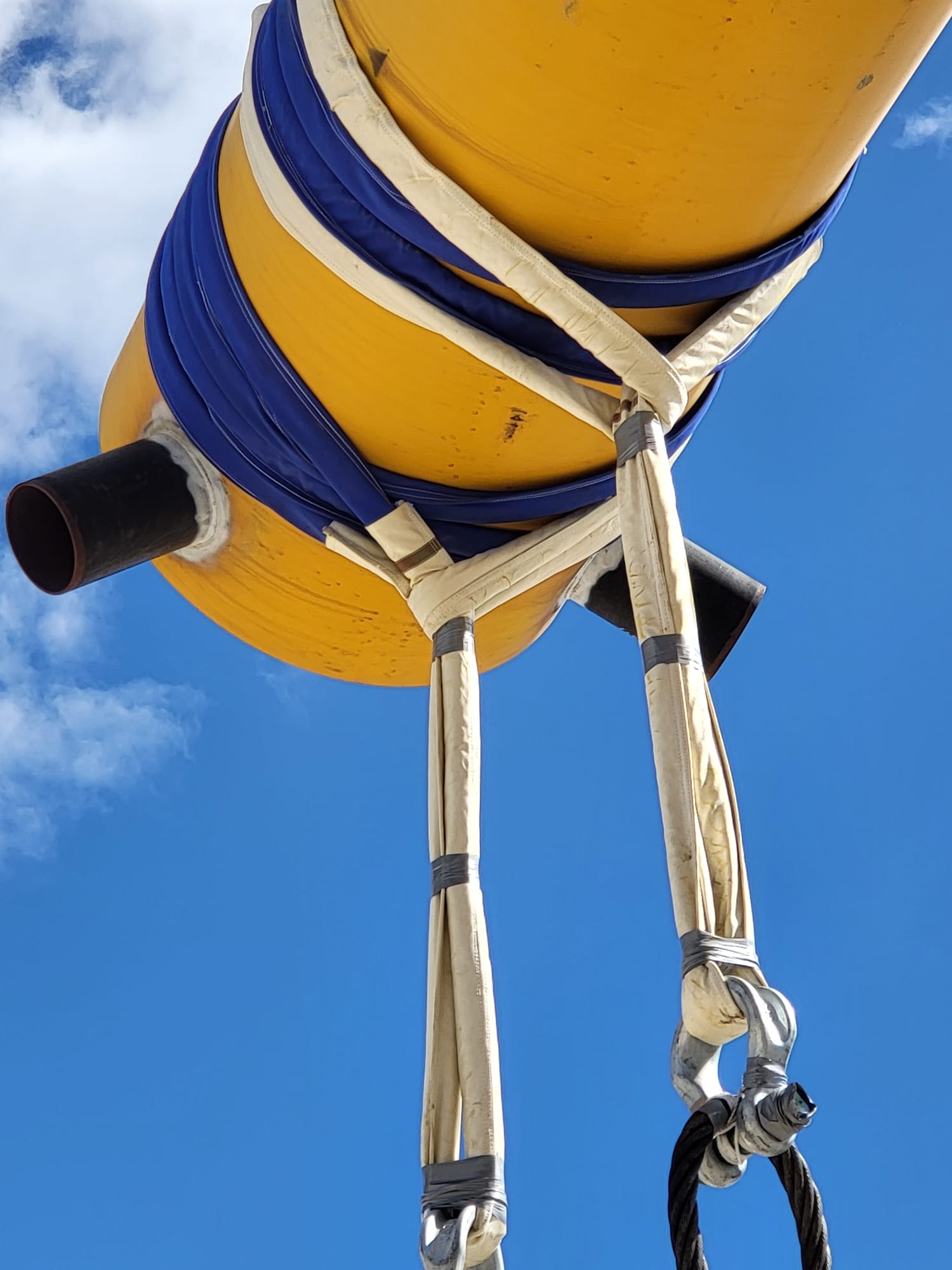 Two NXRS 250 round slings choked around a coated subsea pipe spool